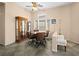 Dining area showcasing tile floors and seating for four with view into living area at 5521 Moss Landing St, North Las Vegas, NV 89031