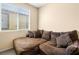 Cozy living room featuring a large sectional sofa with comfortable cushions at 5521 Moss Landing St, North Las Vegas, NV 89031