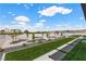 Landscaped backyard with manicured lawn, gravel accents and scenic views at 600 Quail Covey Road, Henderson, NV 89002