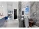 Spa-like bathroom with a soaking tub, separate shower, and luxurious finishes at 600 Quail Covey Road, Henderson, NV 89002