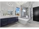 Modern bathroom features a soaking tub, sleek vanity with double sinks, and marble accents throughout at 600 Quail Covey Road, Henderson, NV 89002
