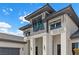 Close-up of a modern home showcasing architectural details and high-end finishes at 600 Quail Covey Road, Henderson, NV 89002