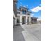 Contemporary home with a striking facade, modern design, and spacious driveway at 600 Quail Covey Road, Henderson, NV 89002