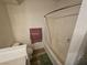 Cozy bathroom featuring a tiled shower/tub combo with modern fixtures at 7115 S Durango Dr # 208, Las Vegas, NV 89113