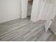 Neutral bedroom with light gray vinyl flooring and a closet at 7115 S Durango Dr # 208, Las Vegas, NV 89113