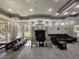 Relaxing common area offers a fireplace, cozy seating, and an inviting space for residents to gather and socialize at 7115 S Durango Dr # 208, Las Vegas, NV 89113