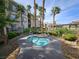 Relaxing hot tub area with mature landscaping providing privacy at 7115 S Durango Dr # 208, Las Vegas, NV 89113