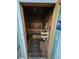 Private sauna room featuring wooden benches, a heater, and a relaxing ambiance for residents to unwind and rejuvenate at 7115 S Durango Dr # 208, Las Vegas, NV 89113