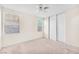 Bedroom with large closet, natural light, and ceiling fan at 719 Roberta Alecia Ave, North Las Vegas, NV 89031