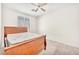 Bedroom with bed, ceiling fan, and natural light from window at 719 Roberta Alecia Ave, North Las Vegas, NV 89031