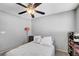 Bedroom with a ceiling fan and minimalist decor at 722 Chepstow Ave, Las Vegas, NV 89178