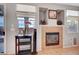 Stylish fireplace with decorative niches, adding character and warmth to the living space at 722 Chepstow Ave, Las Vegas, NV 89178