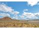 Desert landscape featuring mountain views and vibrant blue skies offering a serene and picturesque backdrop at 722 Chepstow Ave, Las Vegas, NV 89178