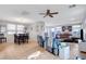 Inviting living room featuring tile floors, ceiling fan and comfortable seating at 722 Chepstow Ave, Las Vegas, NV 89178