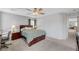 Large main bedroom boasts ceiling fan, neutral walls and carpeted floor at 722 Chepstow Ave, Las Vegas, NV 89178