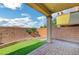 Covered patio with artificial turf, perfect for outdoor relaxation at 722 Chepstow Ave, Las Vegas, NV 89178