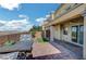 Outdoor patio with brick flooring and seating area at 722 Chepstow Ave, Las Vegas, NV 89178