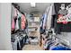 Organized walk-in closet with wire shelving for ample storage at 722 Chepstow Ave, Las Vegas, NV 89178