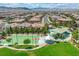 An aerial photograph of neighborhood park with green space, basketball court, and playground at 7613 Pulpit Rock Ct, Las Vegas, NV 89166