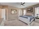 Bedroom featuring carpeted floor, neutral paint, and an abundance of natural light at 7613 Pulpit Rock Ct, Las Vegas, NV 89166