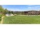 A large grassy area in the community provides picnic tables and common green space at 7613 Pulpit Rock Ct, Las Vegas, NV 89166