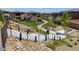 Landscaped community space with a walking path, stairs, and desert landscaping at 7613 Pulpit Rock Ct, Las Vegas, NV 89166