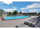 Spacious pool area with ample seating and clear blue water, perfect for summer fun at 7613 Pulpit Rock Ct, Las Vegas, NV 89166
