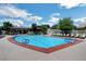 Large community pool with plenty of lounge chairs for relaxing in the sun at 7613 Pulpit Rock Ct, Las Vegas, NV 89166