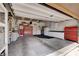 Spacious garage with ample storage cabinets, appliances and organization solutions at 7613 Pulpit Rock Ct, Las Vegas, NV 89166