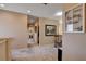 Hallway with carpet flooring, neutral paint, and decorative accents at 7613 Pulpit Rock Ct, Las Vegas, NV 89166