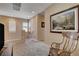 Bright hallway with carpet flooring, neutral paint, and decorative accents at 7613 Pulpit Rock Ct, Las Vegas, NV 89166