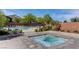 Inviting hot tub with clear, bubbling water and lounge chairs nearby for relaxation at 7613 Pulpit Rock Ct, Las Vegas, NV 89166