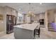 A spacious kitchen with a large center island and modern stainless steel appliances at 7613 Pulpit Rock Ct, Las Vegas, NV 89166