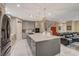 Spacious kitchen island with integrated cooktop, seating, and storage at 7613 Pulpit Rock Ct, Las Vegas, NV 89166