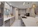Bright kitchen featuring stainless steel appliances and a large kitchen island at 7613 Pulpit Rock Ct, Las Vegas, NV 89166