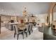 Open-concept living space with a dining area, living room, and kitchen at 7613 Pulpit Rock Ct, Las Vegas, NV 89166