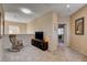 Cozy loft area with a rocking chair and view into another room at 7613 Pulpit Rock Ct, Las Vegas, NV 89166