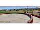 Spacious outdoor space with views of mountains, benches, and a stage for community events and gatherings at 7613 Pulpit Rock Ct, Las Vegas, NV 89166