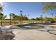 Community splash pad with water features, swings, and shaded benches, offering a fun way to cool off at 7613 Pulpit Rock Ct, Las Vegas, NV 89166