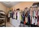 Spacious walk-in closet featuring ample storage space and well-organized shelving for clothes and accessories at 7613 Pulpit Rock Ct, Las Vegas, NV 89166