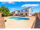 Enjoy the outdoors in this backyard featuring a pool and spacious patio area at 7857 Midnight Ride St, Las Vegas, NV 89131