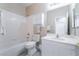 Cozy bathroom features a vanity, toilet, shower and bath at 7857 Midnight Ride St, Las Vegas, NV 89131