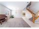 Bright living area with a staircase and views to other rooms at 7857 Midnight Ride St, Las Vegas, NV 89131