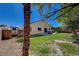 Grassy backyard with space for RV or trailer storage, enhancing outdoor enjoyment at 8041 Villa Rosarito St, Las Vegas, NV 89131