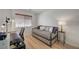 Bright bedroom featuring a daybed, desk, and natural light from a window at 8041 Villa Rosarito St, Las Vegas, NV 89131