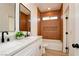 Bathroom with double sinks, modern vanity, and tiled shower-tub combination at 8080 Black Orchid Ave, Las Vegas, NV 89131