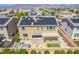 Aerial view of the home features solar panels, covered patio, a hot tub, and beautiful desert landscaping at 813 Bluebird Hill Ave, North Las Vegas, NV 89084