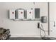 This garage features Tesla power storage, wall-mounted electrical panels, and vehicle charging equipment at 813 Bluebird Hill Ave, North Las Vegas, NV 89084