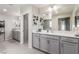 Luxurious main bathroom with double sinks and lots of storage at 813 Bluebird Hill Ave, North Las Vegas, NV 89084