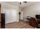 Office space with hardwood floors and natural light featuring ample room for storage, shelving and work space at 813 Bluebird Hill Ave, North Las Vegas, NV 89084